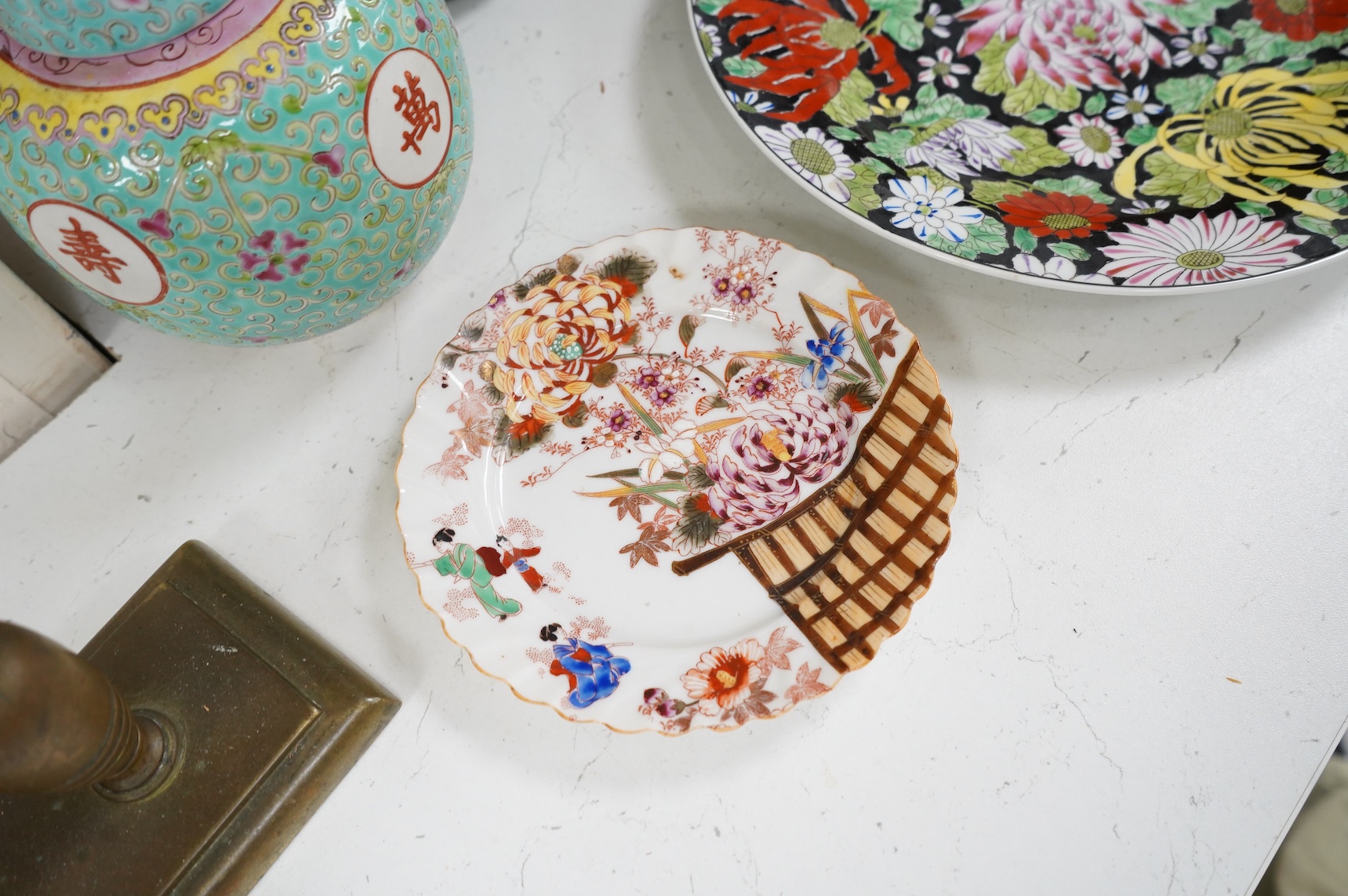 A collection of Chinese ceramics to include enamelled ginger jar and cover, floral plate and a vase, largest 40cm high